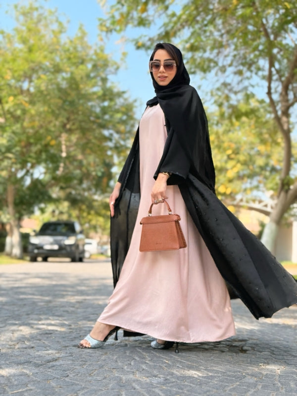 Nyla black self-print & plain fabric abaya, best-selling modest wear in UAE and Saudi Arabia, front view.