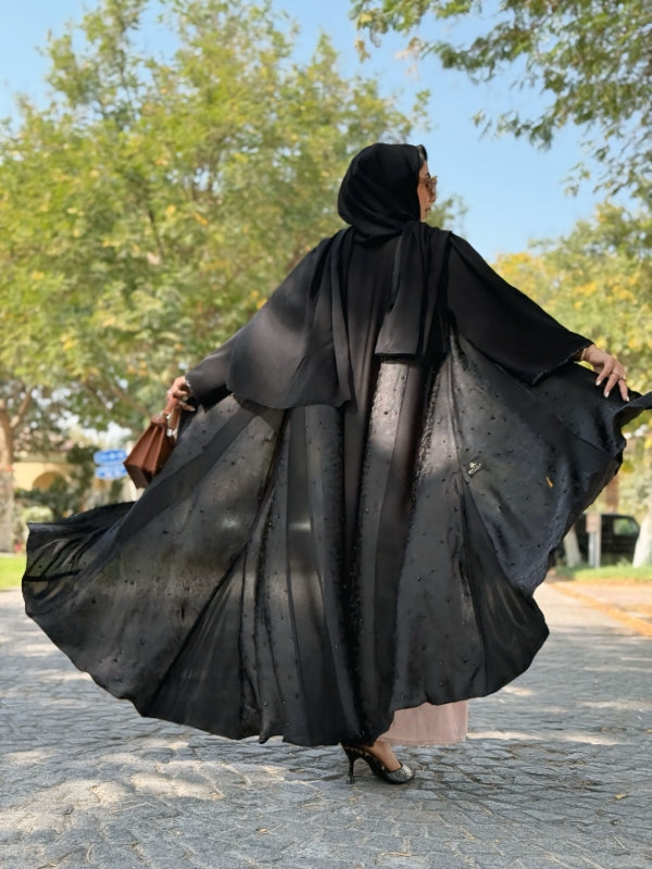 Back view of Nyla black self-print abaya, trending eid collection in dubai